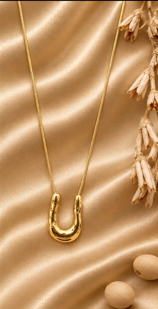 Celine Hammered Arc Necklace — necklace with minimal styling