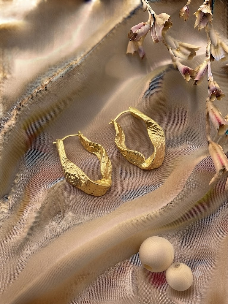 Nagina Twisted Hoop Earrings — earring with statement styling